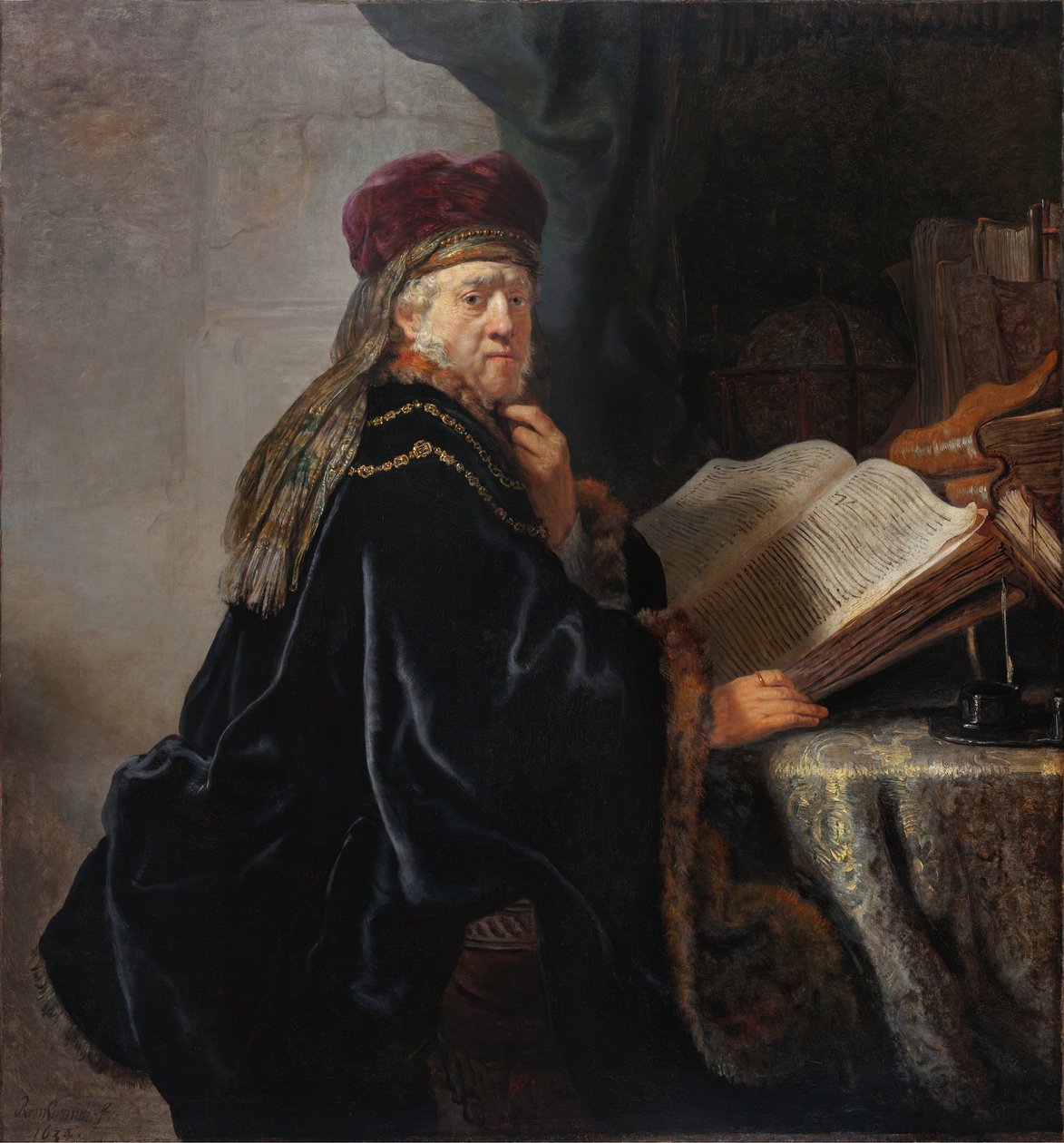 A Scholar in His Study by Rembrandt van Rijn