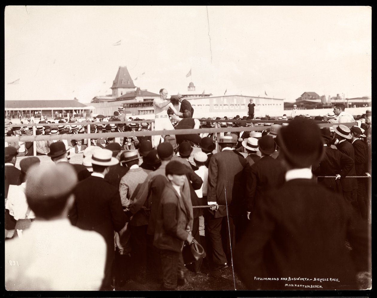 A boxing match between Robert Prometheus Fitzsimmons and Bosworth on the day of a bicycle race at Manhattan Beach, New York by Byron Company