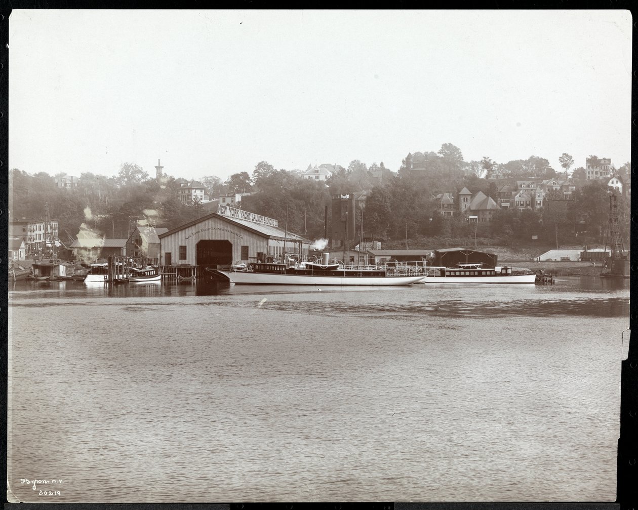 View of the Pier and Boatworks of the New York Yacht, Launch and Engine Co. on the Harlem River, New York, 1905 by Byron Company