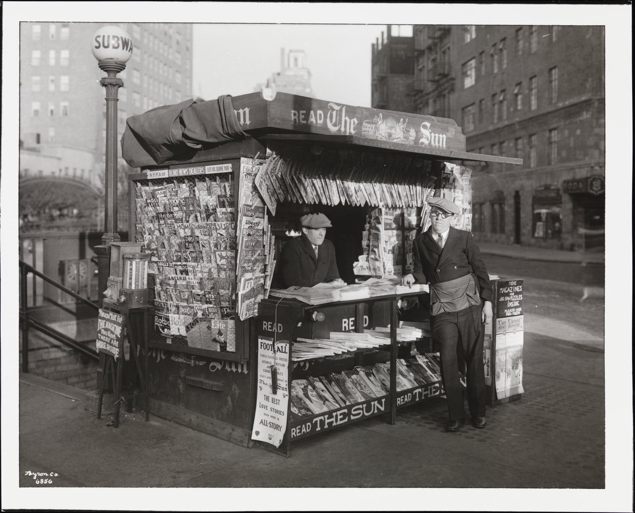 A Newspaper Stand by Company Byron