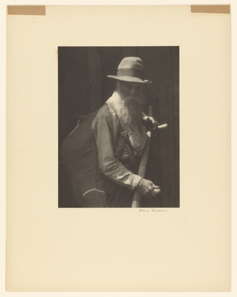 Farmer With Scythe by Doris Ulmann