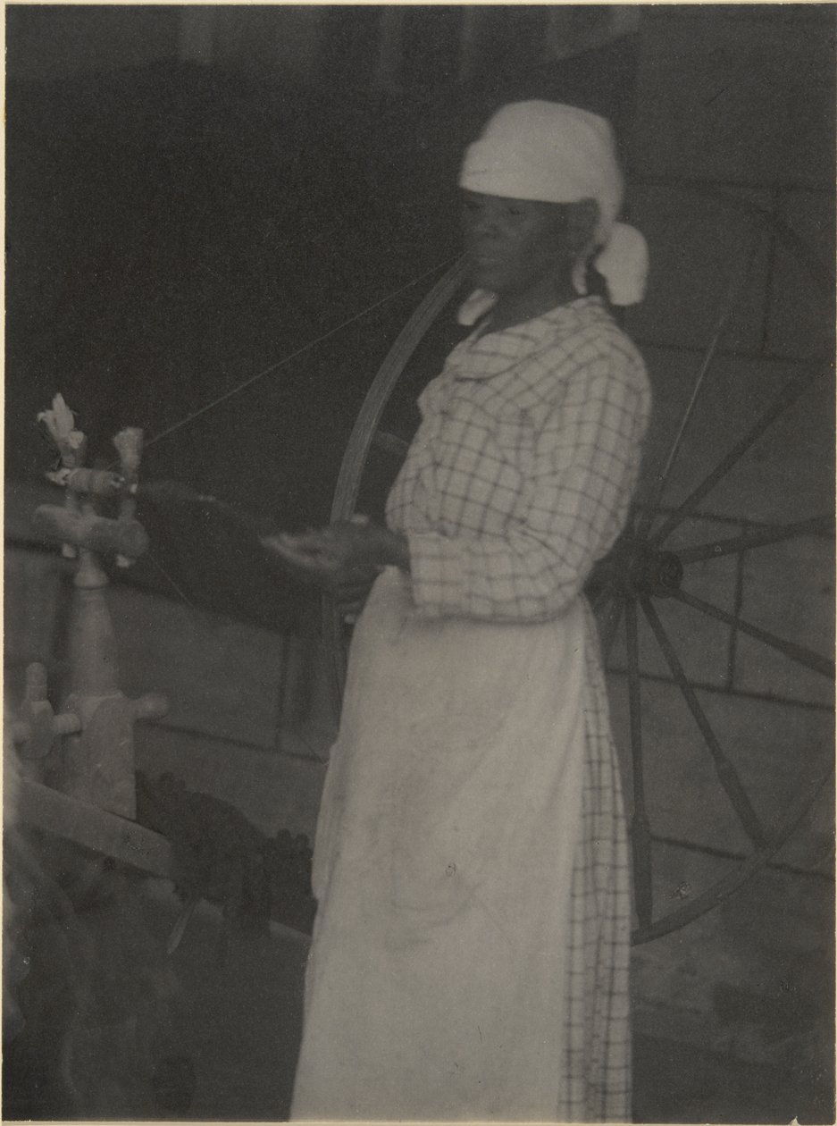 Woman at Spinning Wheel by Doris Ulmann