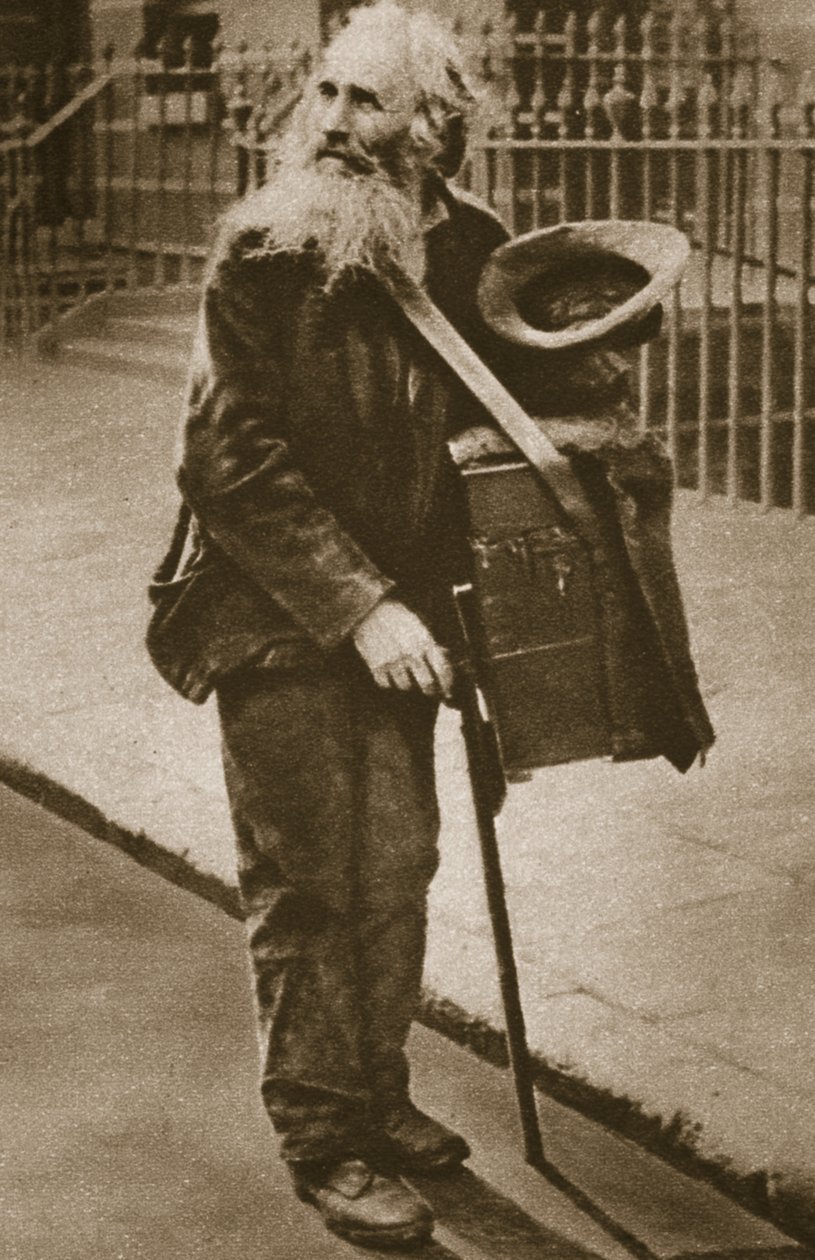 A street musician by English Photographer