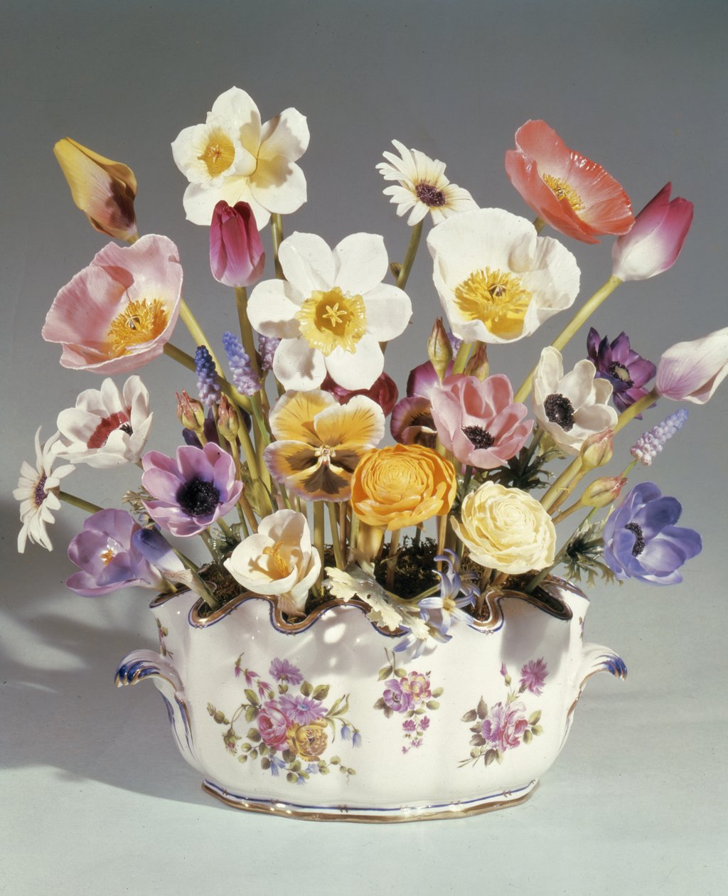 Flowers in a pot by English School