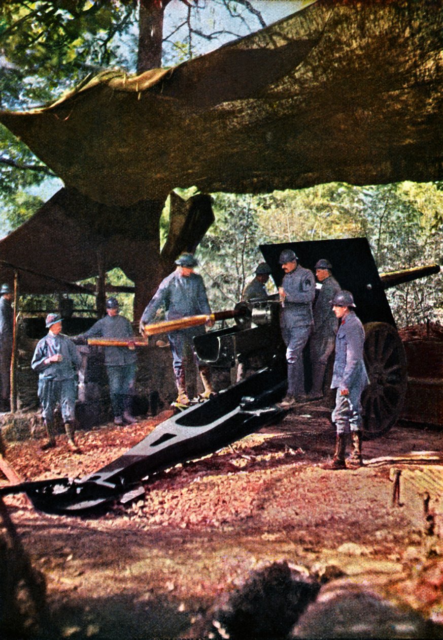 A French battery of heavy guns under camouflage netting in the forest, Verdun, September 1916 by Jules Gervais Courtellemont