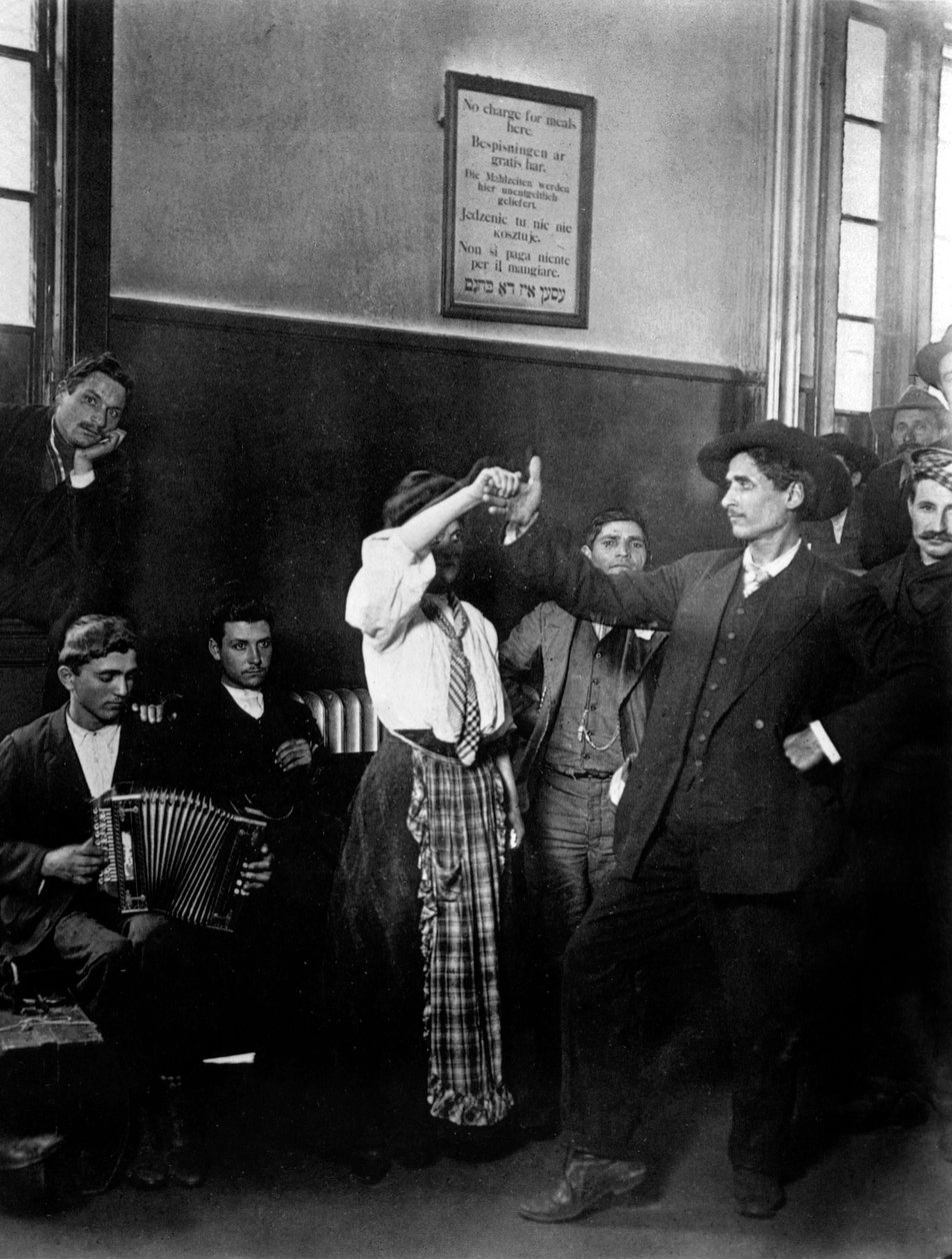 Immigrants in Ellis Island by Lewis Wickes Hine