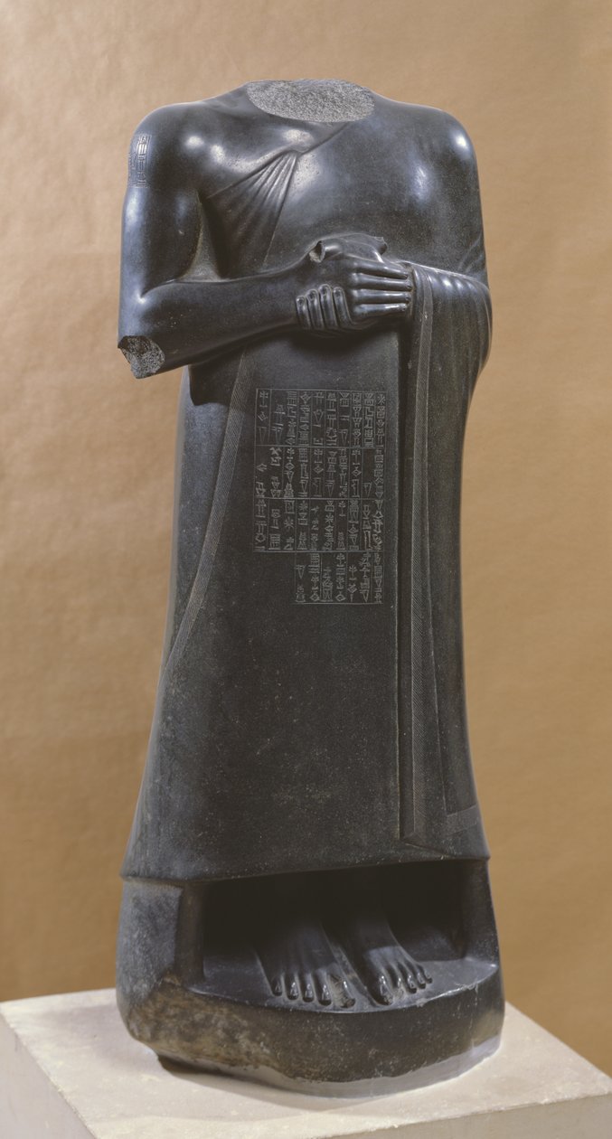 Gudea, Prince of Lagash, standing by Mesopotamian