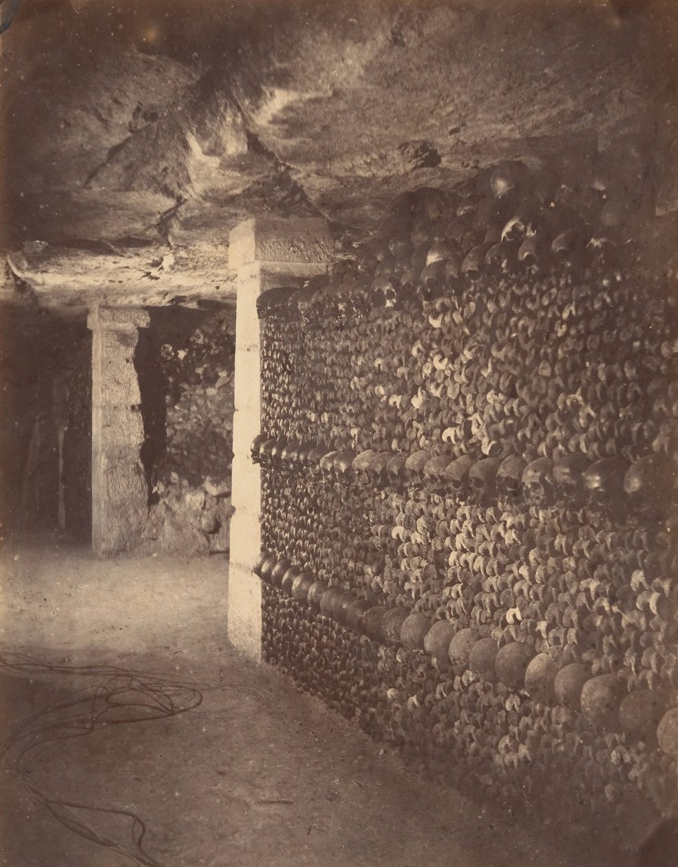 Catacombs, Paris, April 1862 by Nadar