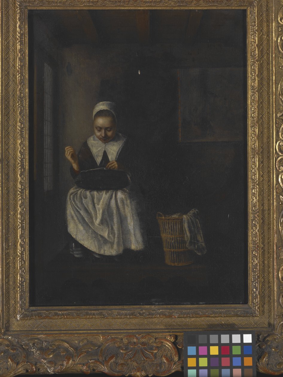 A Girl Sewing by Nicolaes Maes