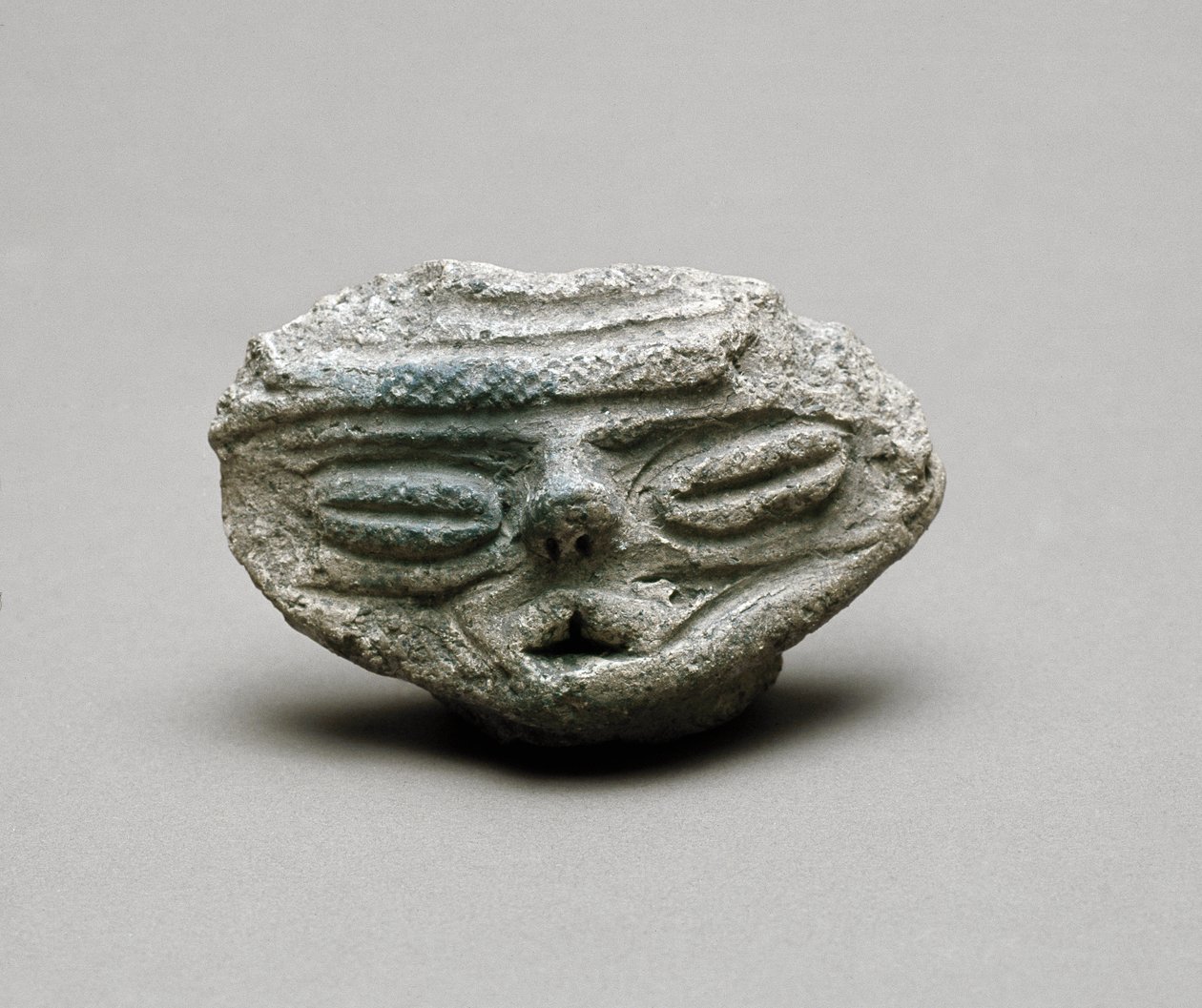 Terracotta head, Jomon period 6th-3rd century BC by Japanese School