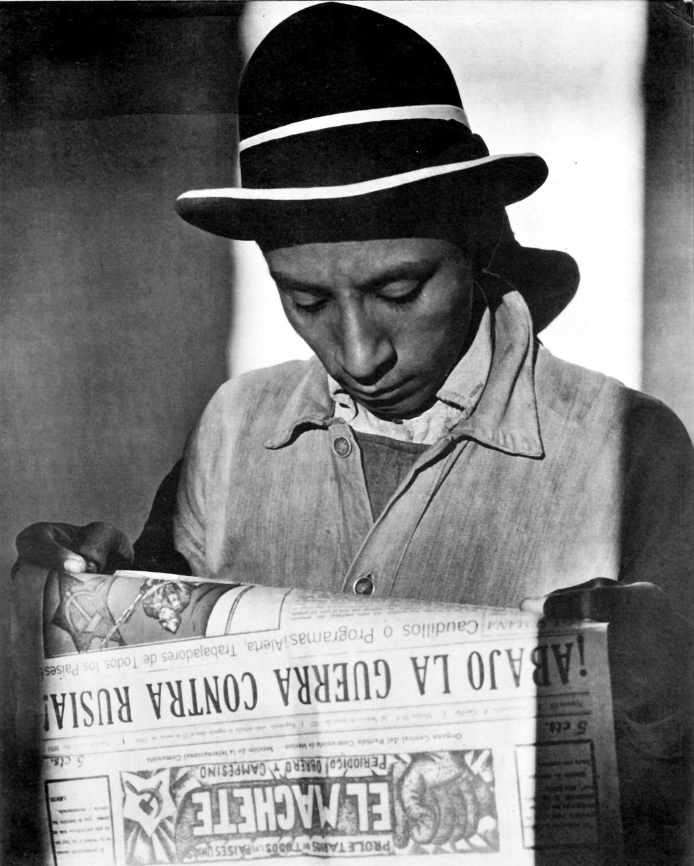 Worker Reading El Machete, Mexico City by Tina Modotti