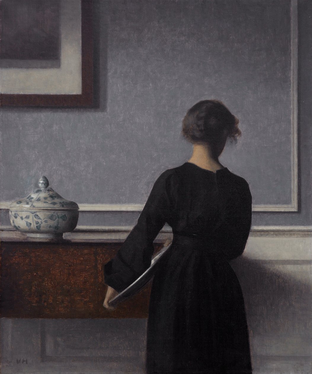 Interior with Young Woman from Behind by Vilhelm Hammershøi