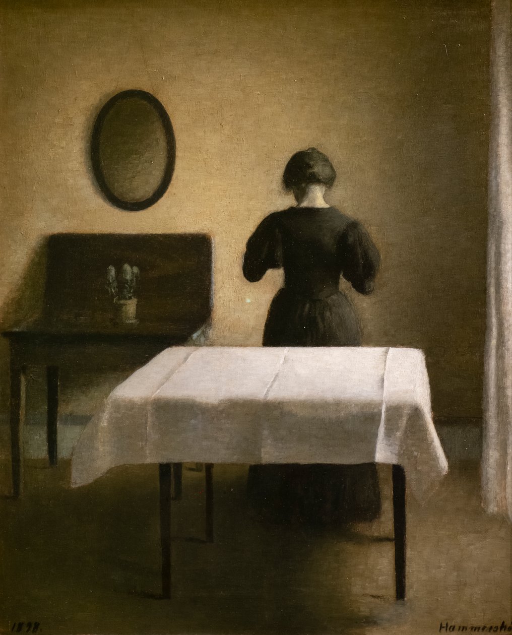 Interior with a Black Woman by Vilhelm Hammershoi