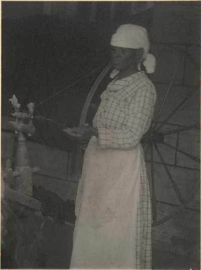 Woman at Spinning Wheel by Doris Ulmann