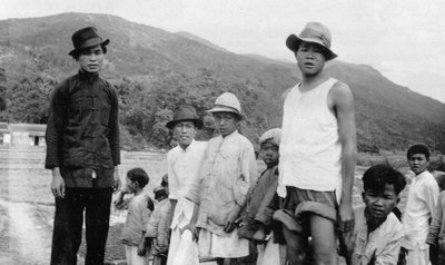 Group of men in Hong Kong by English Photographer
