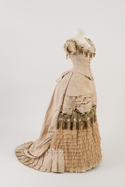 Evening Dress of Dark Cream Ribbed Silk by English School