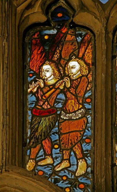 Window depicting musician angels with oboes by English School