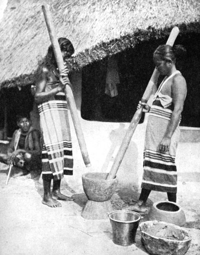Newar Women Pounding Grain, Nepal by Ewing Galloway