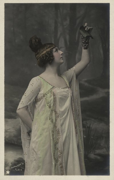 Woman with bunch of grapes by French Photographer