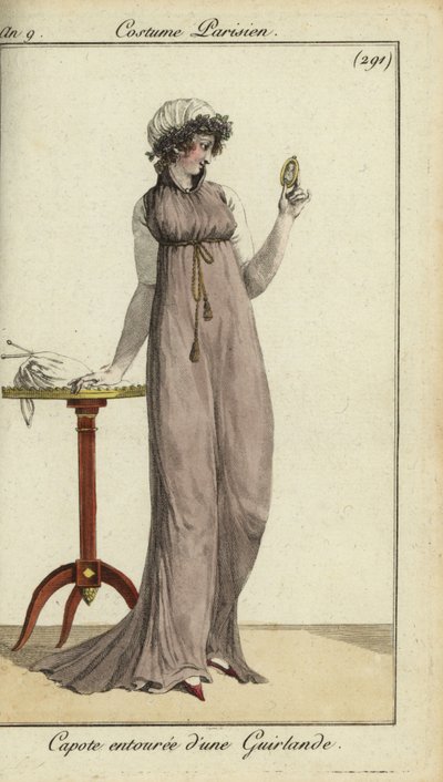 Fashionable woman looking at a locket by French School
