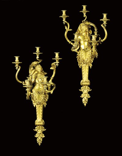 Pair of five-light bras de lumieres by Henri Dasson