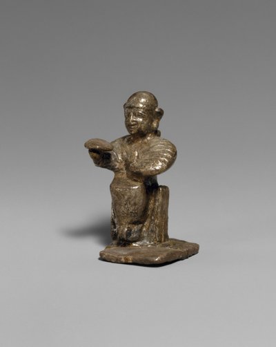 Seated female by Hittite