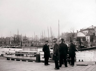 Men by a canal boat, Rotterdam by James Batkin