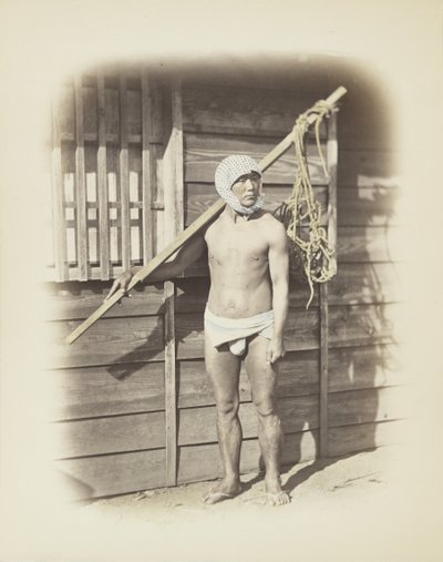 Man with fishing basket by Japanese Photographer