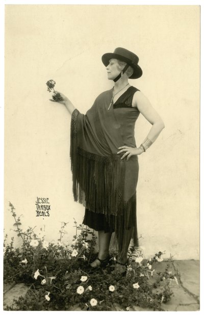 Woman Holding a Flower by Jessie Tarbox Beals