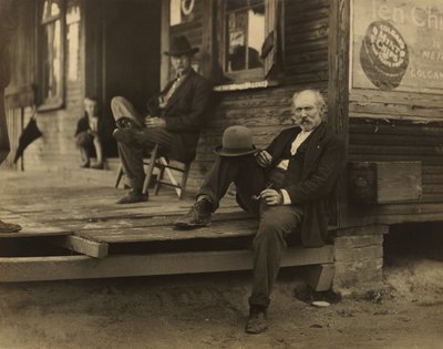 Two Men & Boy on Porch by Lewis W. Hine