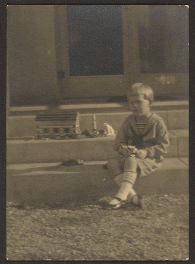 Boy with Toys on Steps by Louis Fleckenstein