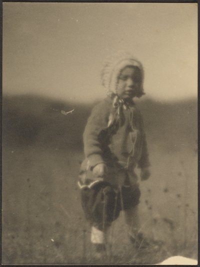 Child Wearing a Bonnet in Field by Louis Fleckenstein