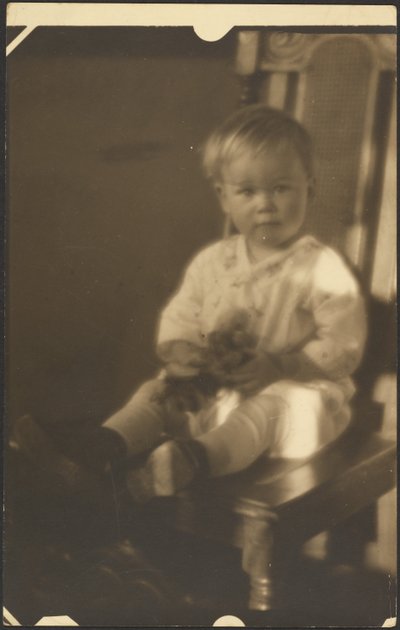 Child on Big Chair by Louis Fleckenstein