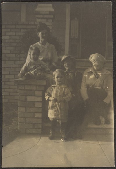 Family Portrait Outside House by Louis Fleckenstein