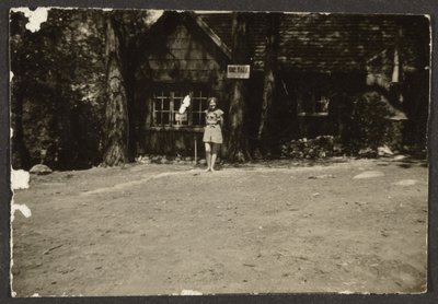 Woman before Cabin by Louis Fleckenstein
