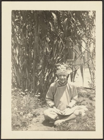 Woman in Costume Sitting in Garden by Louis Fleckenstein