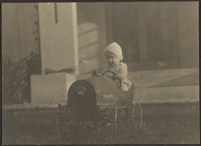 Young Child in Super Six Car by Louis Fleckenstein