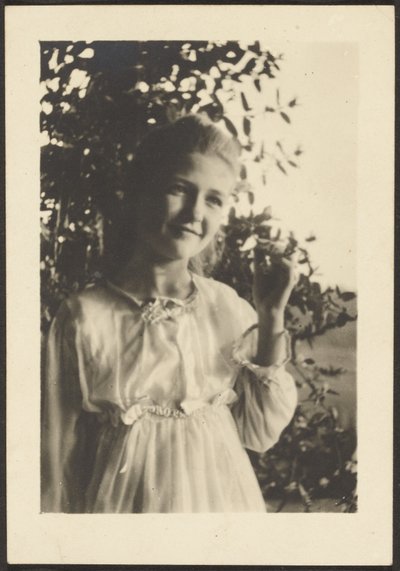 Young Woman Standing in Tree by Louis Fleckenstein