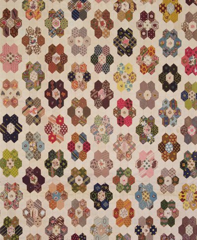 Detail of a patchwork bedcover by Mary Butler