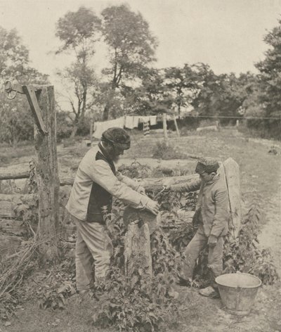 At the Grindstone--A Suffolk Farmyard by Peter Henry Emerson