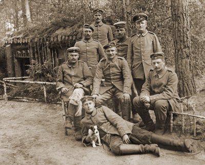 Group of German soldiers with a dog by Photographer German
