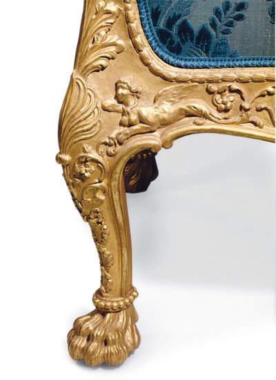 A George III giltwood sofa by Robert Adam