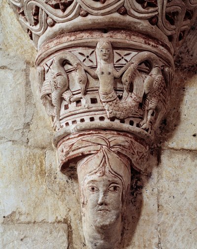 A mermaid, carved capital of the chancel by Romanesque