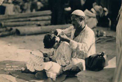 A Street Barber, Cairo, Egypt by Unbekannt