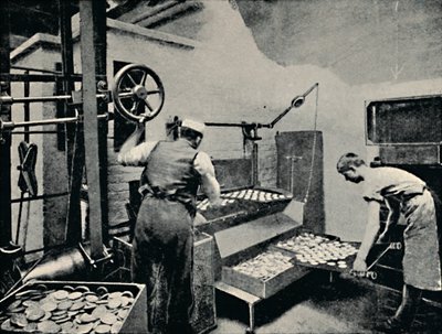 Removing Biscuits from Oven by Unbekannt