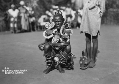Snake charmer, Sierra Leone by Unbekannt