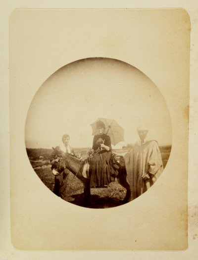 Woman riding a donkey, c 1890 by Unbekannt