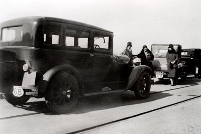 Women and parked cars by Unbekannt