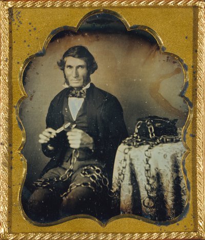 Folk Artist with Carved Wooden Chain by Unidentified