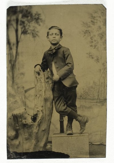 Untitled (Portrait of Boy Leaning) by Unknown